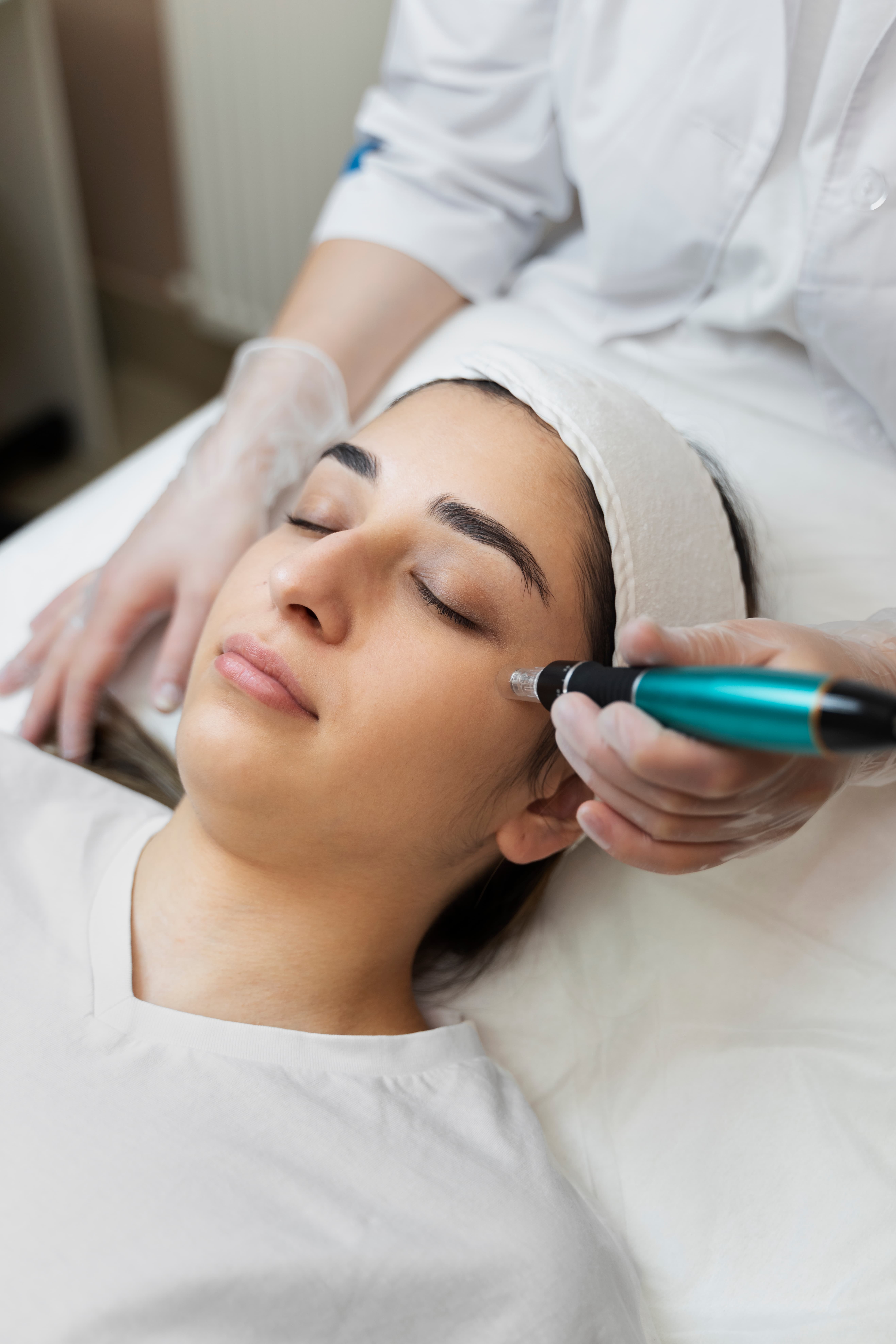 person getting micro needling beauty treatment 2 1 Micro-needling in Louisville